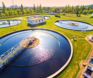 Aerial view to sewage treatment plant. Grey water recycling. Waste management in European Union.